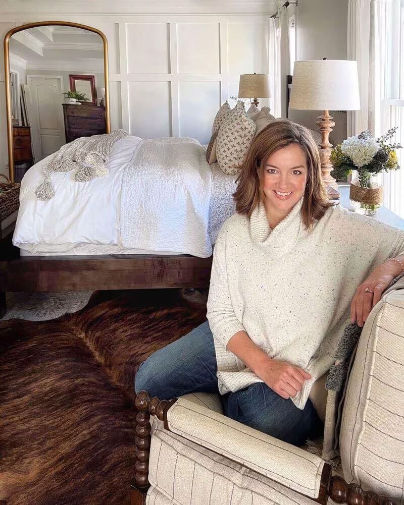 Julia sitting in her bedroom