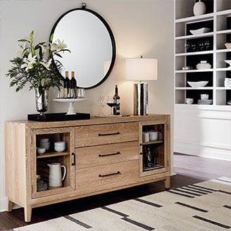 Oak credenza with lamp and decor on top