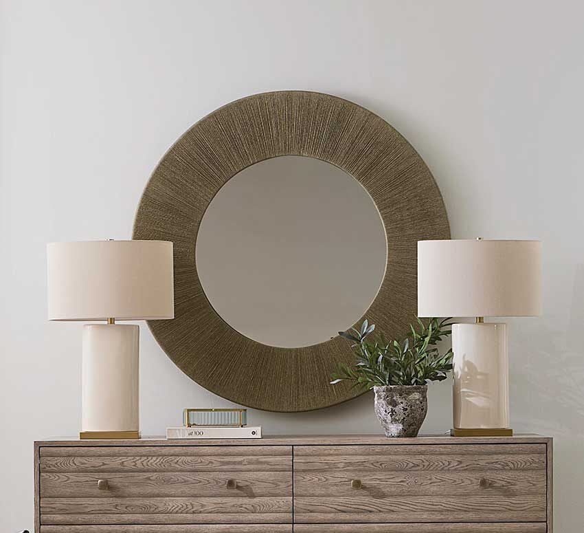 Lamps on credenza with wall mirror