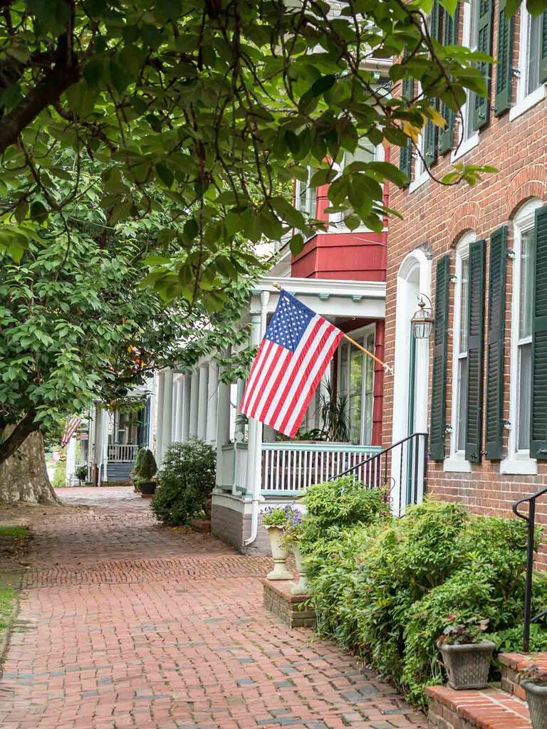 Row of homes with American flag