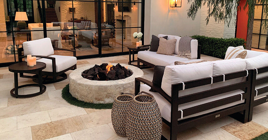 Fire pit surrounded by outdoor furniture