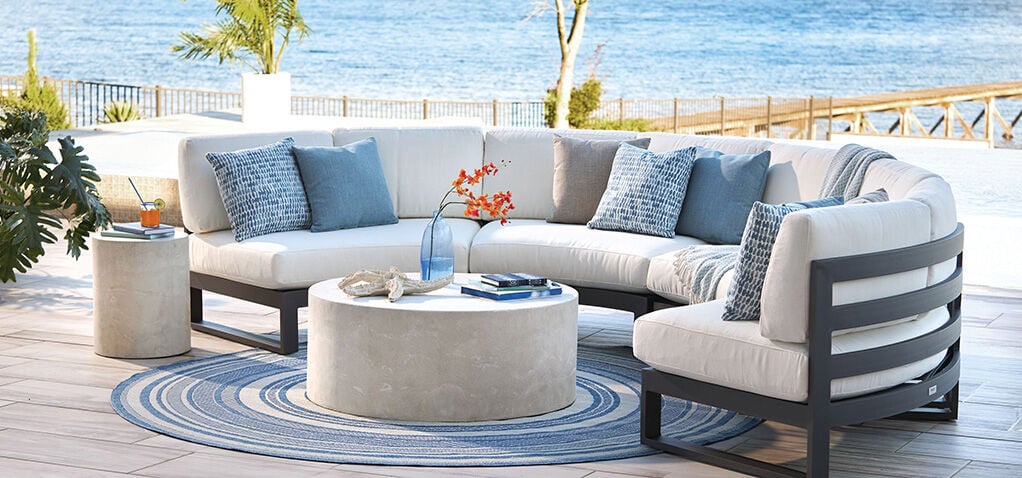 Curved Bonavista Sectional in front of ocean