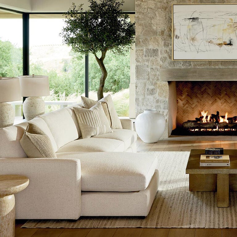 Allure sectional and sofa in living room with fireplace