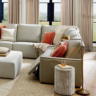 Reclining sectional with footrest extended