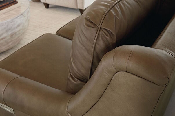 Stationary reclining leather chair